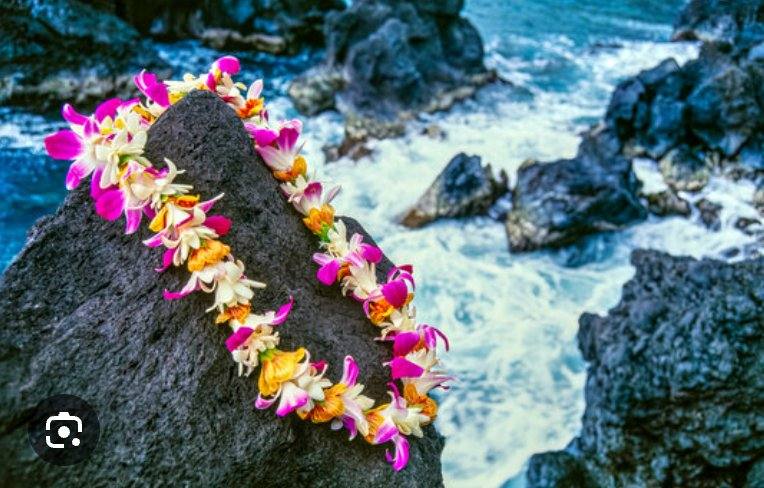 Hawaiian lei by the ocean
